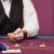 dealer-dealing-cards-casino-855x458